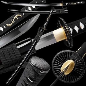 May include: A white ceramic mug with a black handle and the text "But First, Coffee" in a black, handwritten-style font. The mug is on a white surface.