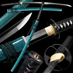 May include: A collection of Japanese katana swords. The blades are silver, and the handles are black. The scabbards are teal with a glittery finish. The swords are displayed against a black background.