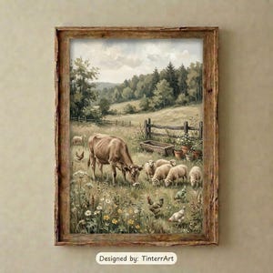 May include: A framed wall art print depicting a pastoral landscape with a brown cow grazing in a wildflower meadow alongside several sheep and chickens. A wooden fence, a trough, and a forest line the background. Text reads: Designed by: TinterrArt.