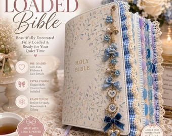 May include: A white Holy Bible with a delicate blue and green leaf pattern on the cover. The book features a gold-toned charm chain with blue flowers, bows, and hearts attached to the spine. The edges are decorated with blue gingham and lace.
