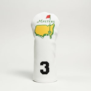 Puede incluir: Funda blanca para la cabeza del palo de golf con el logotipo de Masters en verde y amarillo, y una bandera roja. El número 3 está impreso en negro en la parte inferior. Diseñado para proteger los palos de golf.