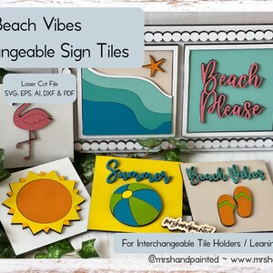 May include: Interchangeable sign tiles with a beach theme. The tiles feature a flamingo, a sun, a beach ball, flip flops, and a wave with a starfish. The tiles are made of wood and are painted in various colours, including pink, yellow, blue, green, and orange. The tiles are designed to be used with interchangeable tile holders or leaning ladder signs. The text "Beach Vibes" is displayed at the top of the image.