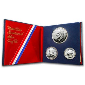 Conjunto de 3 moedas comemorativas do bicentenário dos EUA, cunhadas em prata 40%, de 1976, com certificado de autenticidade.