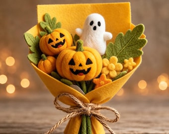 May include: A felt bouquet featuring two orange jack-o'-lantern pumpkins with black stitched faces, a small white ghost figure with a black face, green felt leaves, and small yellow flowers, all wrapped in yellow felt and tied with a brown twine bow.