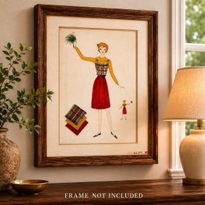 Op de afbeelding: Ingelijste mode-illustratie met een vrouw in een rode rok, gele top en geruit vest, die een groene tak vasthoudt. Het kunstwerk bevat stofstalen en een kleinere figuur. De lijst is van donker hout. De tekst onderaan luidt "FRAME NOT INCLUDED".