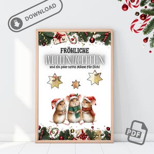 May include: A framed Christmas print with three mice in Santa hats and scarves. The print features the German text "FRÖHLICHE WEIHNACHTEN" and "und ein paar nette Mäuse für Dich!" with star and gift box illustrations. A "DOWNLOAD" icon is in the upper left.