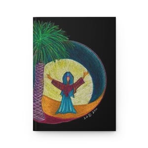 May include: A black hardcover journal featuring a colored pencil drawing of a figure in a blue robe with arms outstretched, standing on tan ground beneath a green palm tree, set against a circular yellow and blue background with the text JJ 2011.