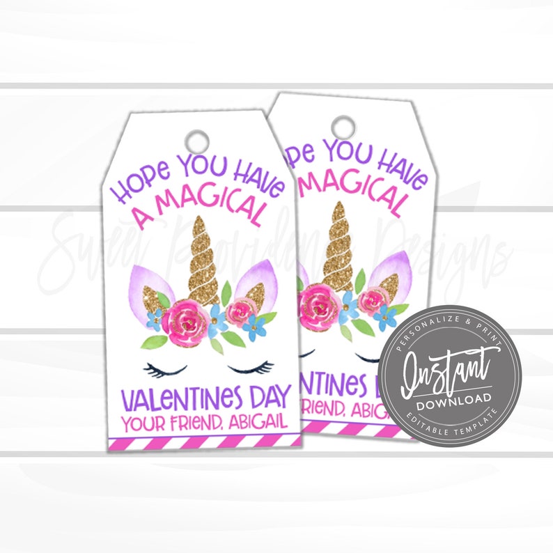 May include: Two white Valentine's Day gift tags with a unicorn design. The tags feature a gold horn, pink roses, and the text "Hope You Have A Magical Valentine's Day". The tags are personalized with the name "Abigail".