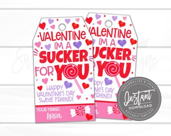 May include: Two printable Valentine's Day gift tags with a pink and white background. The tags feature a red and white lollipop with the text "I'm a sucker for you" and hearts. The text "Happy Valentine's Day Sweet Friend!" and "Your Friend, Anna" are also included.