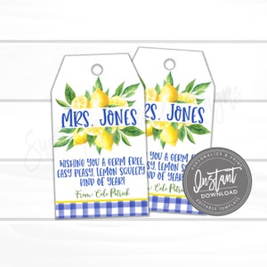 May include: Two printable gift tags with a lemon theme. The tags feature a watercolor illustration of lemons and green leaves. The text on the tags reads "Wishing you a germ free, easy peasy, lemon squeezy kind of year!" and "From: Cole Patrick".