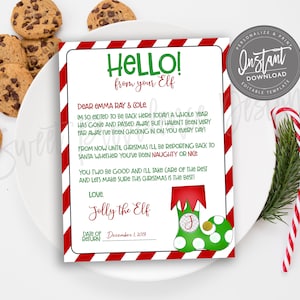 May include: A festive Christmas-themed letter from an elf, featuring red and white striped borders and a green and red elf shoe graphic. The letter is accompanied by chocolate chip cookies, candy canes, and a sprig of greenery.