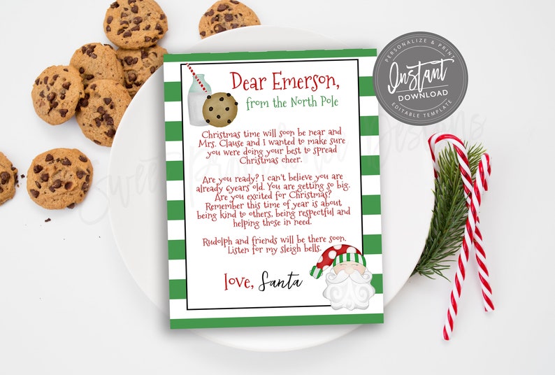May include: A Christmas-themed letter from Santa to Emerson, with a green and white striped border. The letter includes a drawing of milk and cookies, and a Santa Claus illustration. Chocolate chip cookies and candy canes are also visible.
