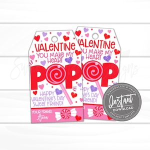 May include: Two Valentine's Day gift tags with a lollipop design. The tags feature the words "VALENTINE", "YOU MAKE MY HEART", and "POP" in red. Additional text includes "HAPPY VALENTINE'S DAY SWEET FRIEND!" and "YOUR FRIEND, Anna". Hearts and candy graphics are also present.