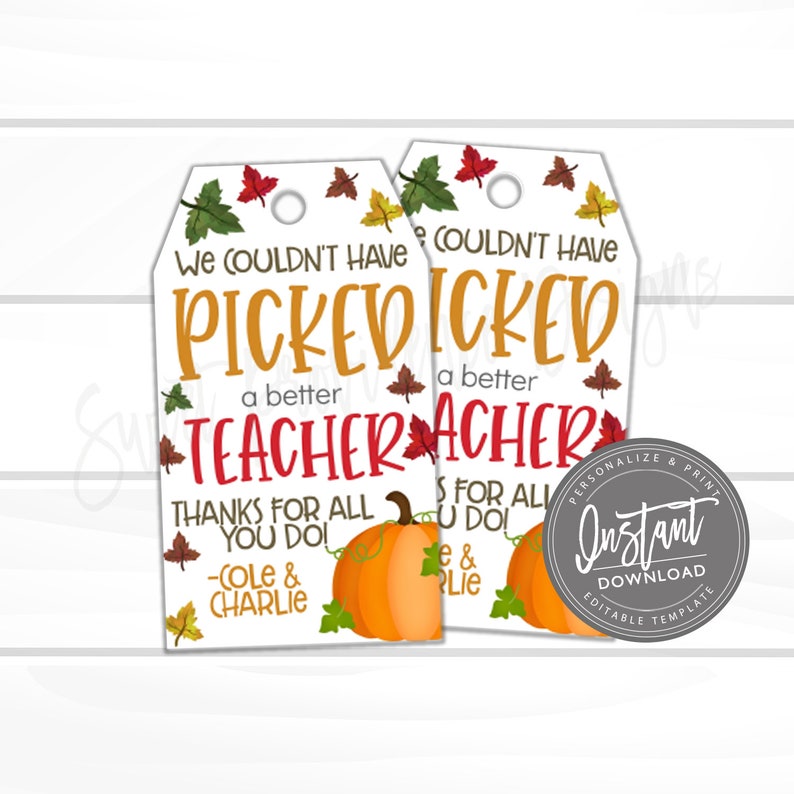 May include: Two rectangular white gift tags with rounded top corners and a hole punch. The text reads WE COULDN'T HAVE PICKED A BETTER TEACHER THANKS FOR ALL YOU DO -COLE & CHARLIE. The design features colorful autumn leaves and an orange pumpkin.