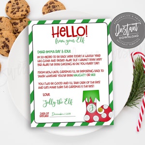 May include: A Christmas-themed letter from an elf, with green and red accents, and the text "Hello from your Elf." The letter is on a white plate with chocolate chip cookies and candy canes.