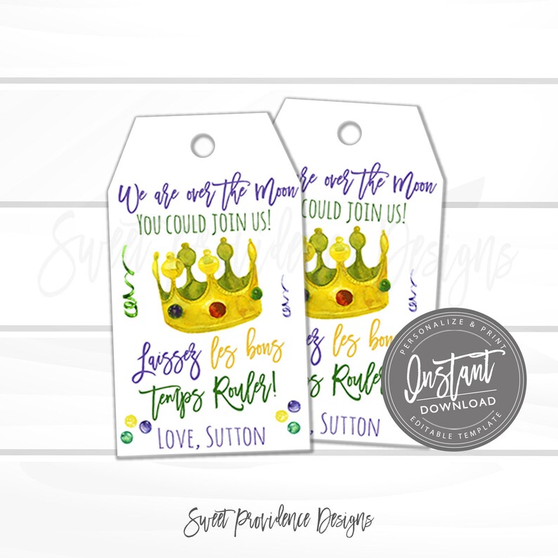 May include: Two white gift tags with a gold crown and purple text. The text reads "We are over the moon YOU COULD JOIN US!" and "Laissez les bons temps rouler! LOVE, SUTTON". The tags are decorated with green, purple, and gold beads.