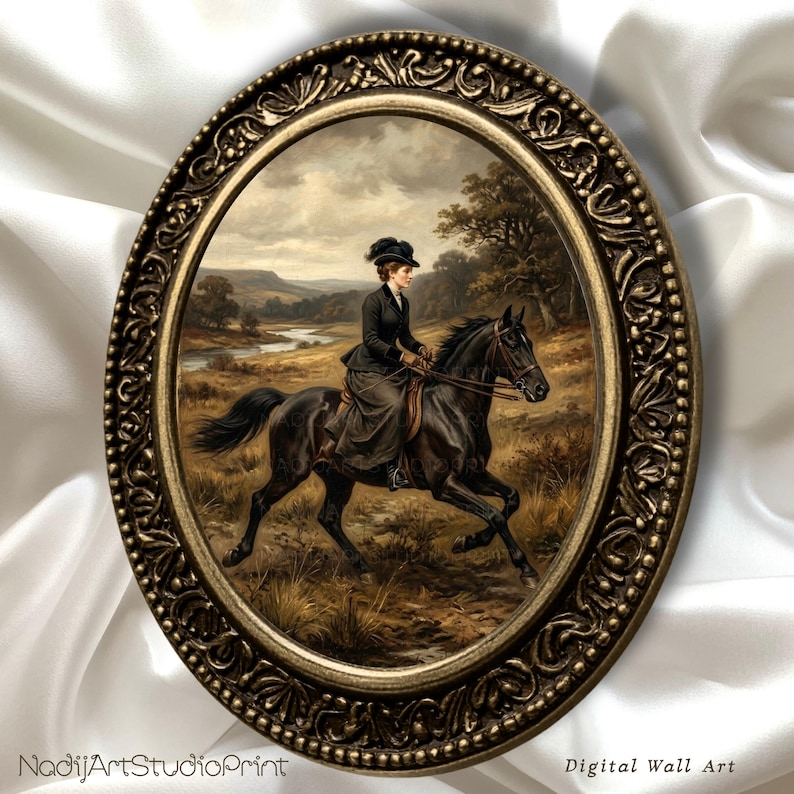 May include: An oval-shaped framed print depicts a woman riding a black horse through a landscape. The artwork features a detailed scene with a river, trees, and a cloudy sky. The frame is ornate with a gold finish. The text "NadiiArtStudioPrint" and "Digital Wall Art" are visible.