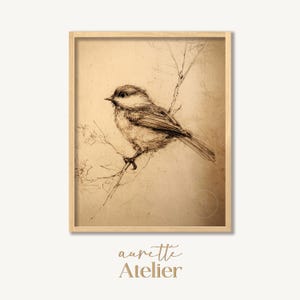 May include: A white ceramic mug with a black handle and the text "But First, Coffee" in a black, handwritten-style font. The mug is on a white surface.