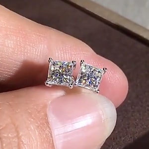 May include: A rustic wooden sign with the text "Welcome to our home" in white lettering. The sign features a distressed finish and a simple, inviting design, perfect for a front porch or entryway.