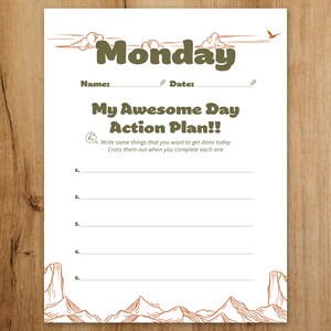 以下が含まれることがあります： 「Monday」の文字が緑色で書かれた白い紙。その上に「My Awesome Day Action Plan!!」の文字。タスクを書き込むための線と、完了したタスクを書き出して消すためのプロンプトが含まれています。装飾的な雲と山。