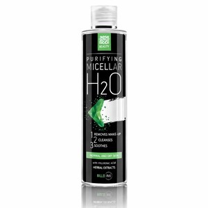 Puede incluir: Una botella negra y transparente de agua micelar purificante. La botella tiene una tapa blanca y una etiqueta con el texto "Bodi Beauty", "Purifying Micellar H2O" y "Removes Make-Up, Cleanses, Soothes". Para pieles normales y secas.