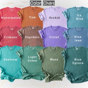 May include: A color chart displaying various t-shirts in different colors, including Watermelon, Yam, Orchid, Ice Blue, Crimson, Espresso, Violet, Blue Jean, Seafoam, Light Green, Moss, and Blue Spruce. The text "Color Chart" is at the top.