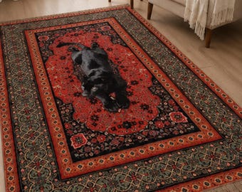 May include: A rectangular area rug featuring a central black panther illustration on a vibrant red background. The rug is decorated with intricate black and red floral patterns and a wide border with geometric motifs, finished with short fringe edges.