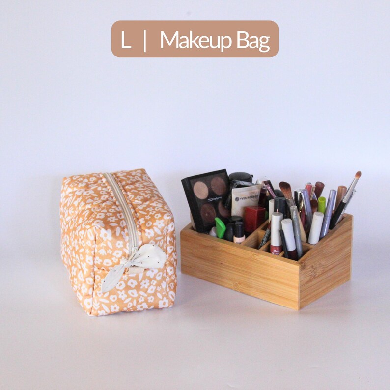 Large and small quilted makeup bags stacked together