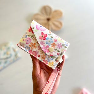 Digital sewing pattern for compact card pouch and keychain charm.