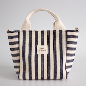 Handmade shoulder bag pattern with long strap and mini tote bag shape