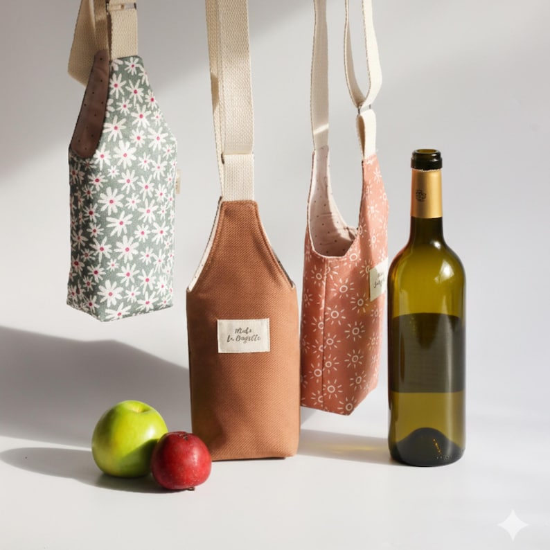 Rust-colored canvas wine bag with a minimalist woven label and polka dot interior lining.