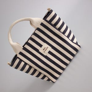 Mini handbag sewing project with inside zipper pocket and clean finish