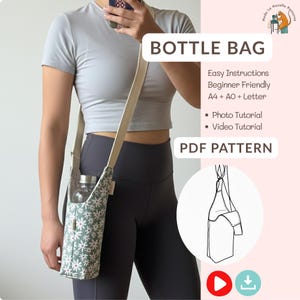 May include: A bottle bag with a floral design, carried by a beige strap. The bag holds a clear water bottle. The image includes the text "BOTTLE BAG", "Easy Instructions", "Beginner Friendly", and "PDF PATTERN".