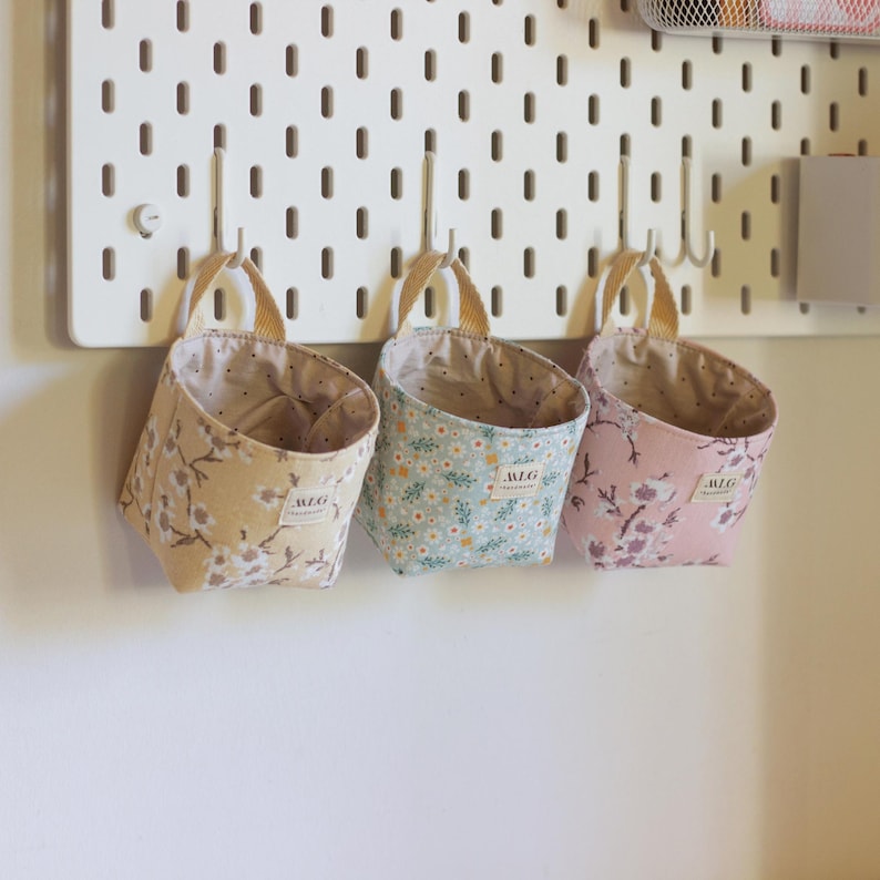 Desk storage basket sewing pattern mounted on IKEA Skadis pegboard