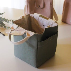 Handmade canvas lunch bag featuring "Let's Eat" and "Bon Appétit" aesthetic labels.
