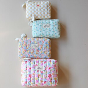 Handmade pouch sewing project using quilted fabric technique