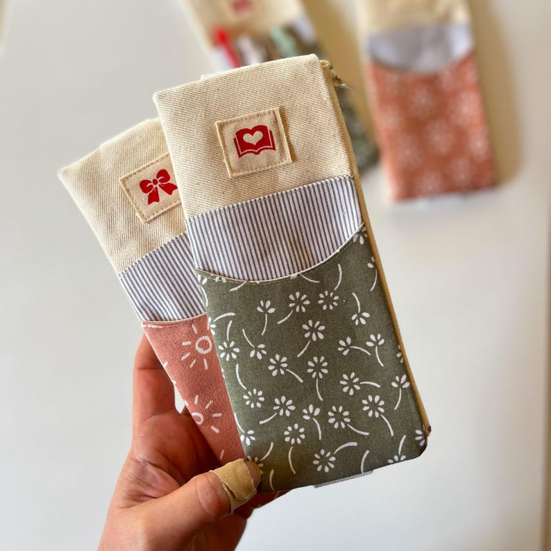 Elastic notebook pen pouch sewing pattern with beginner-friendly step-by-step instructions and video tutorial