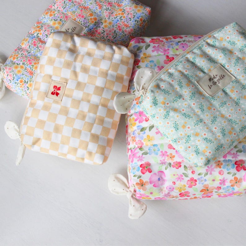 Sewing pattern bundle for quilted cosmetic pouches in four sizes