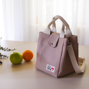 Canvas bag pattern showing a professional-looking meal prep bag with side-by-side pocket storage.