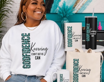 May include: A white sweatshirt, a white spiral-bound notebook, a black tumbler with a straw, a white ceramic mug, and a beige canvas tote bag. Each item features the text "CONFIDENCE Knowing I CAN'T BUT HE CAN" with a teal leopard print pattern.