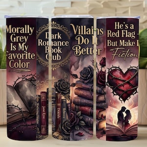 May include: Three stainless steel tumblers with dark romance book-themed designs. The designs include text that reads "Morally Grey Is My Favorite Color", "Dark Romance Book Club", and "He's a Red Flag But Make It Fiction".