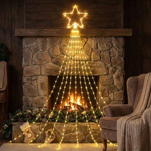 May include: A warm, inviting Christmas scene featuring a stone fireplace adorned with a glowing star-shaped light fixture. Strings of warm white lights cascade down, forming a tree shape. A cozy armchair and a lit fire complete the festive ambiance.