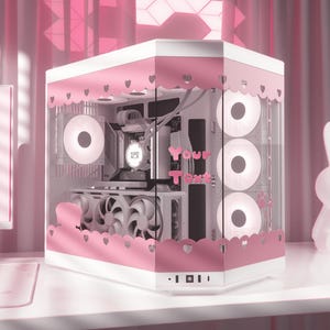 May include: A white and pink computer case with a clear side panel. The case has pink trim with heart cutouts and the text "Your Text". The case contains internal components and illuminated fans.