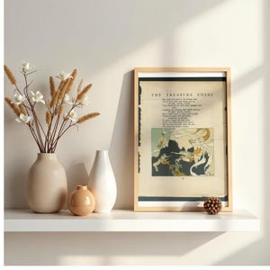 May include: A framed print titled The Treasure Chest featuring a poem and a vintage-style illustration in muted tones. Beside it are three ceramic vases in beige and white, holding dried stems with white flowers and brown feathery plumes.