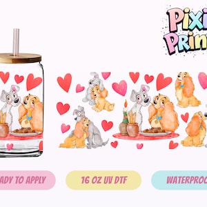May include: A clear glass tumbler with a bamboo lid and straw, featuring a design of two cartoon dogs, hearts, and a candle. The tumbler is 16 oz and has the text "Pixie Prints".