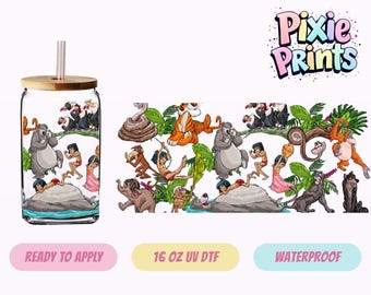 May include: A clear glass tumbler with a bamboo lid and straw, featuring a colorful Jungle Book design. The design includes cartoon characters like Baloo, Mowgli, and Shere Khan. The tumbler is 16 oz and ready to apply.