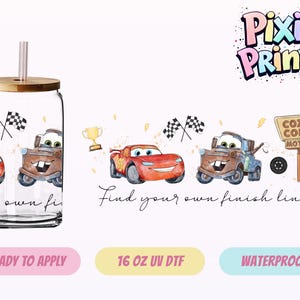 May include: A 16 oz glass tumbler with a bamboo lid and straw, featuring a watercolor design of two cartoon cars, checkered flags, a trophy, and a Cozy Cone Motel sign. The text Find your own finish line is printed in a cursive script.