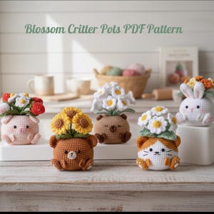 May include: A collection of crocheted critter pots, each with a unique animal design and topped with colorful flowers. The pots include a pig, bear, cat, and bunny, all crafted with soft yarn. The text "Blossom Critter Pots PDF Pattern" is at the top.