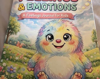 May include: A children's journal titled "My Big Feelings & Emotions" with a colorful illustration of a friendly, furry creature. The cover features the text "A Feelings Journal for Kids" and a sunny sky background.
