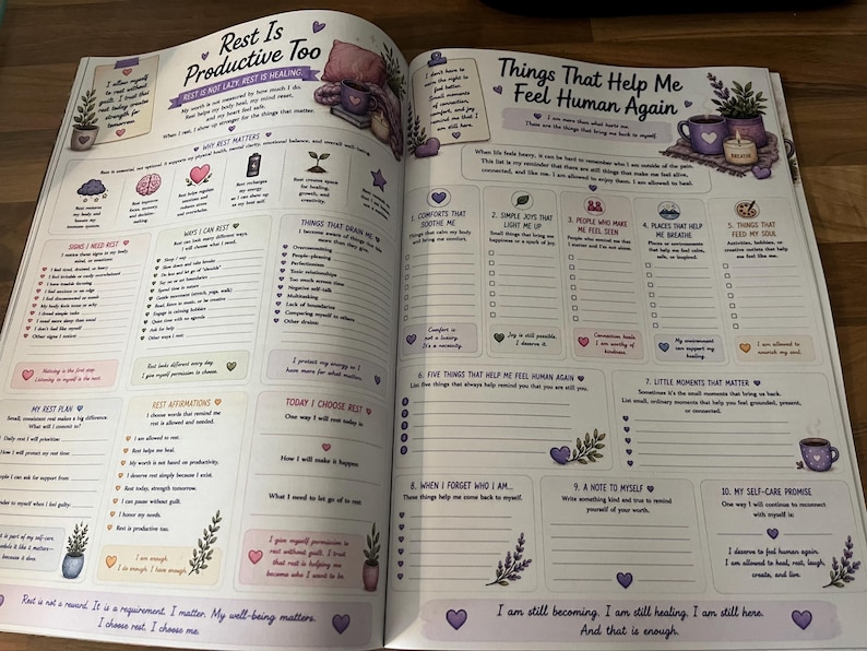 May include: An open self-care journal with two pages featuring purple-themed illustrations, checklists, and prompts. The left page is titled Rest Is Productive Too, and the right page is titled Things That Help Me Feel Human Again, both containing text.
